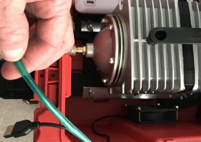 Protect cooling fan wire with tubing
